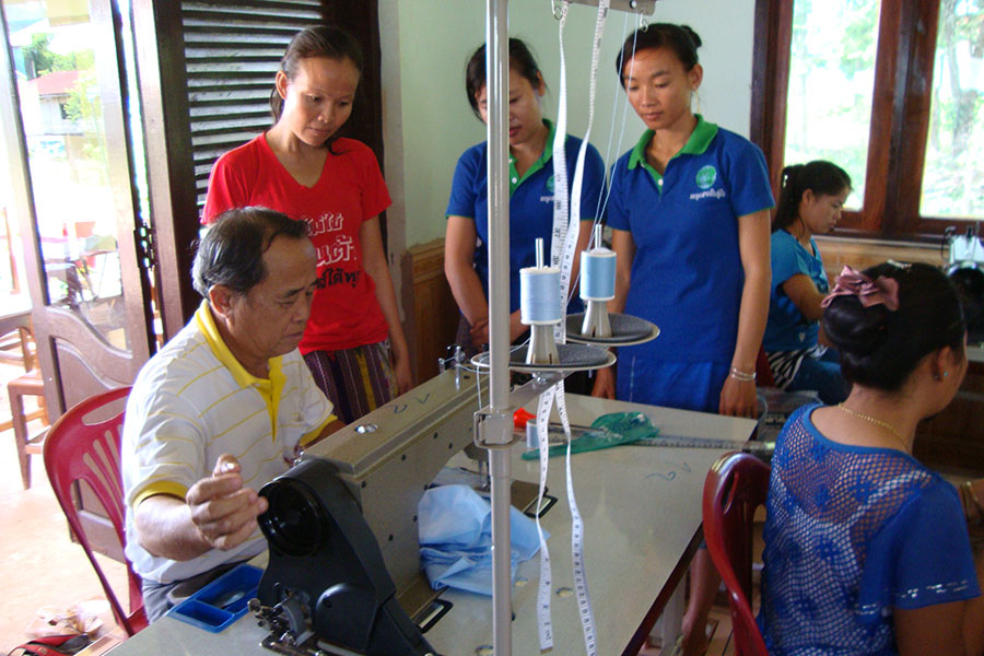 Participants learn how to use their new sewing machines