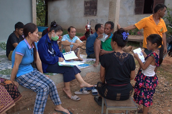 Villagers attending a TB screening session with Ms Moukdaline Keoviset